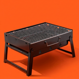 Barbecue Pliable Portatif - Vue 3/4 avant, fond orange