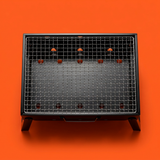 Barbecue Pliable Portatif - Vue top-down, fond orange